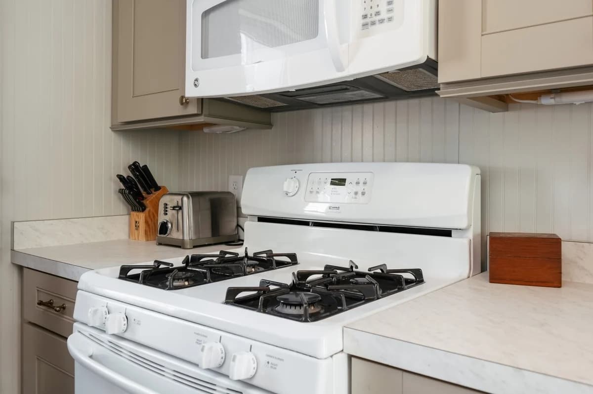 Aurora Cottage | Game Shed & Yard 2BR HOME Downtown & TART Trail | Grill photo 23